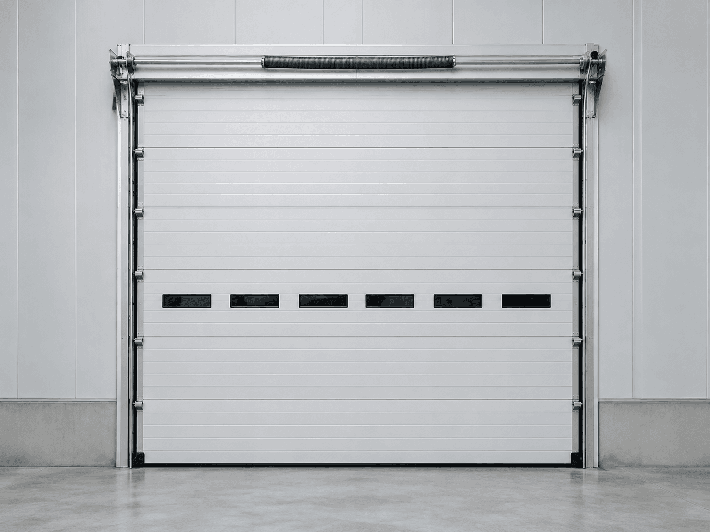 White insulated sectional industrial door