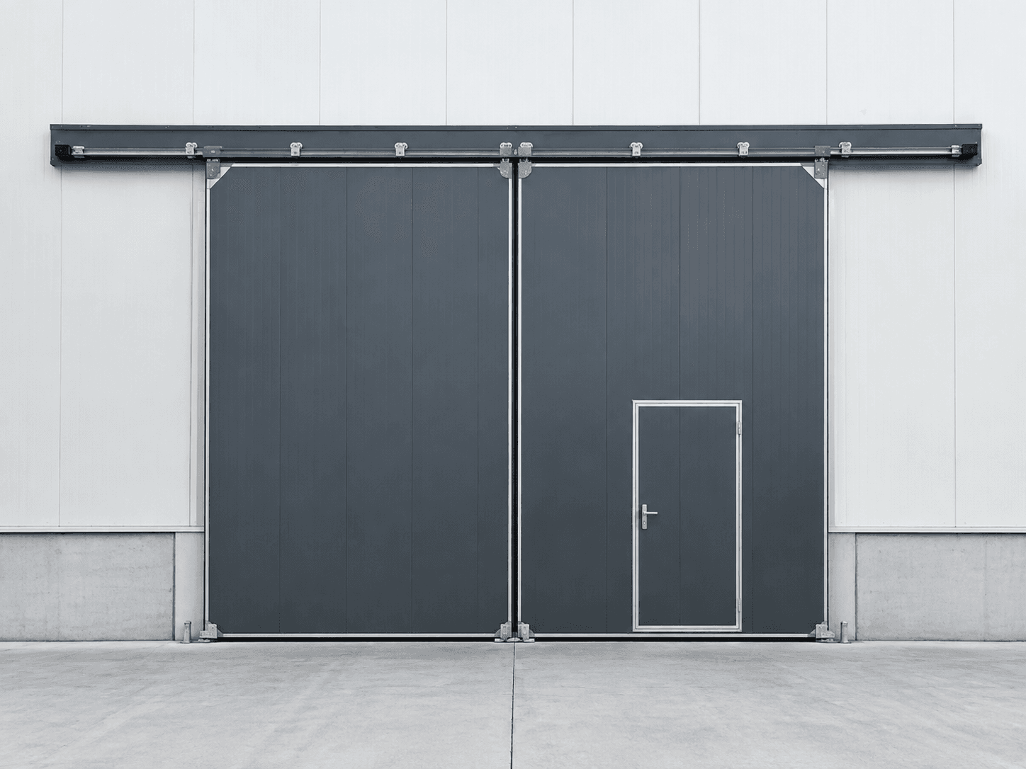 Graphite sliding industrial door